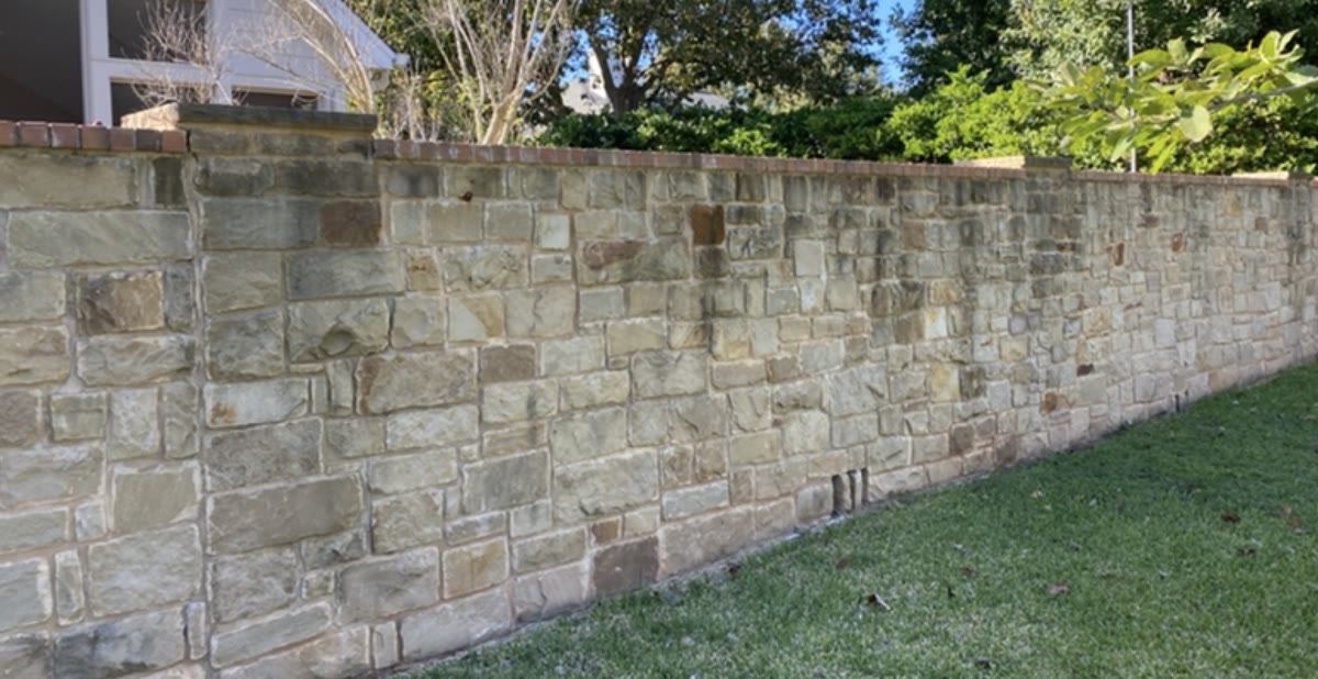 Stone wall before cleaning