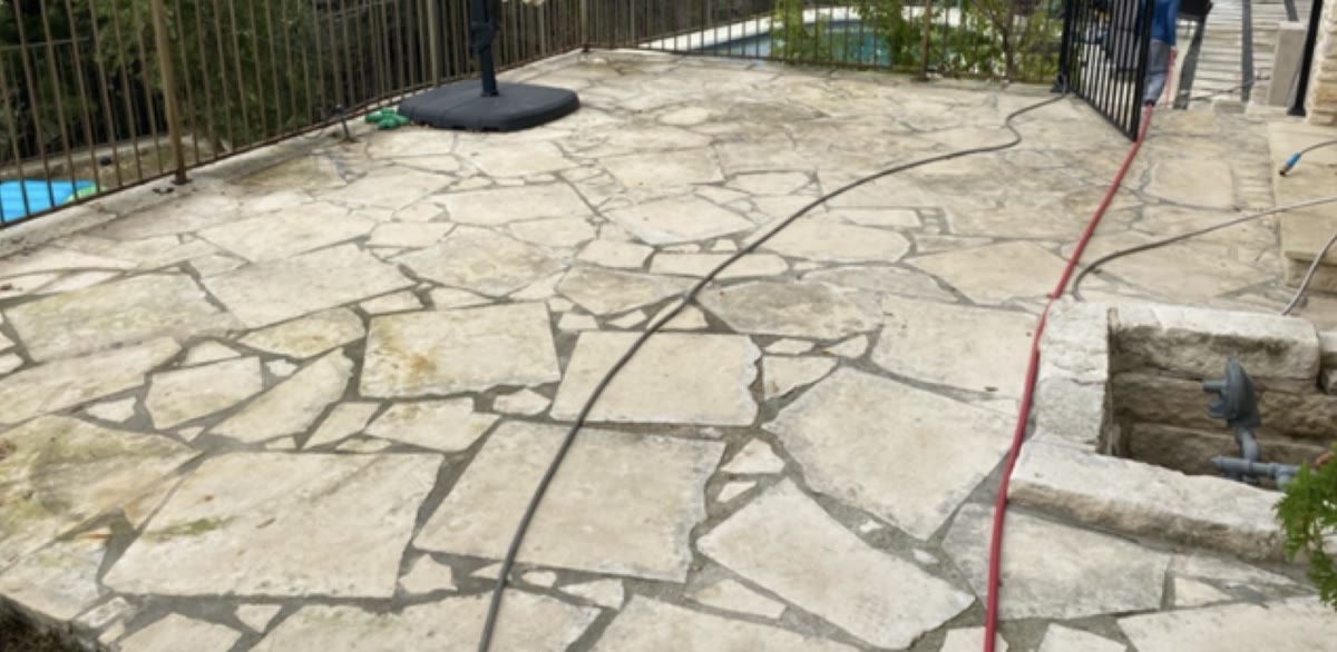 Stone patio before cleaning