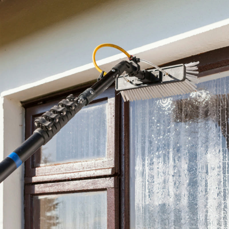 Water-fed pole cleaning a window